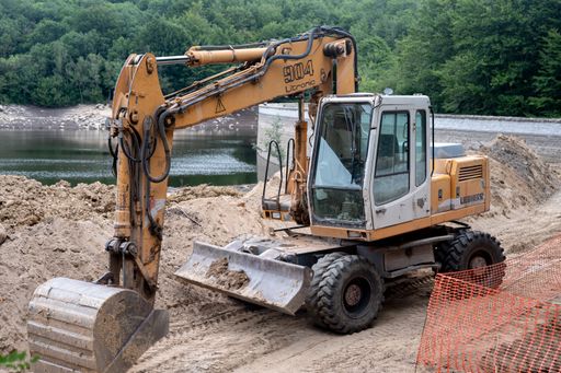 An industrial Liebherr Model 904 excavator working in a construction area