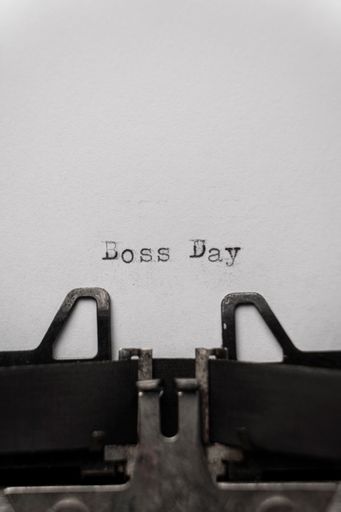 boss day typed words on a vintage vertical typewriter