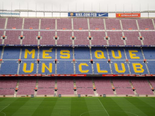 View on the field and the tribunes at Camp Nou arena