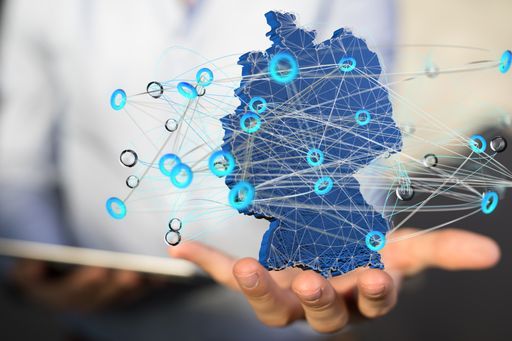 A 3D rendering of a digital german map and networking on a blurred background