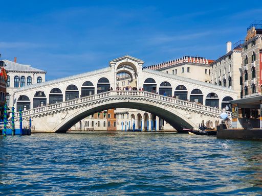 Famous rialto bridge taken from a gondola in the grand canal in venice