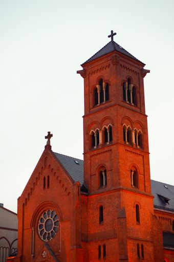 The Sacred Heart of Jesus and St. Florian catholic church against a blue sky in Poznan