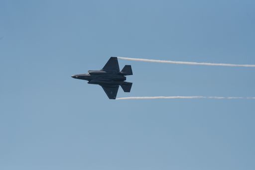 A closeup shot of a military transport aircraft flying in the sky at the 2021 Toronto Airshow, Canada