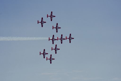 A closeup shot of a group of military aircraft flying in the sky at the 2021 Toronto Airshow, Canada