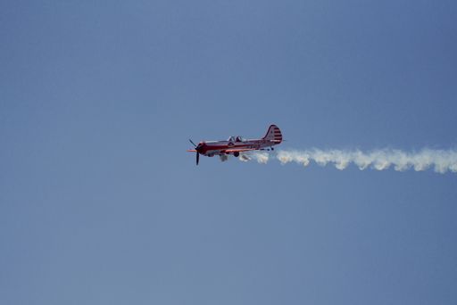 A closeup shot of a military transport aircraft flying in the sky at the 2021 Toronto Airshow, Canada