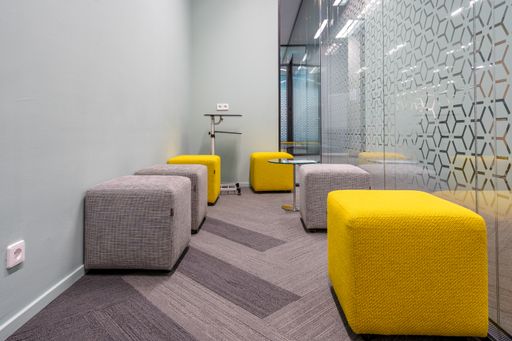 A corner of the open office space with a modern interior design