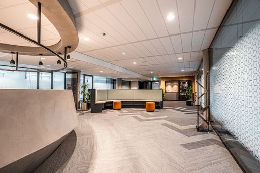A corner of the open office space with a modern interior design