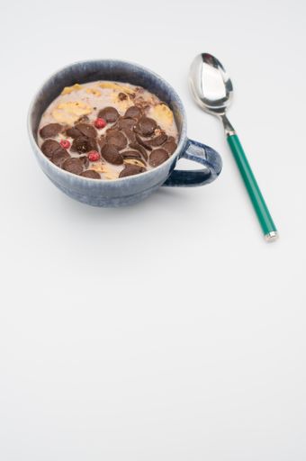 Fresh tasty breakfast with milk and chocolate cereal