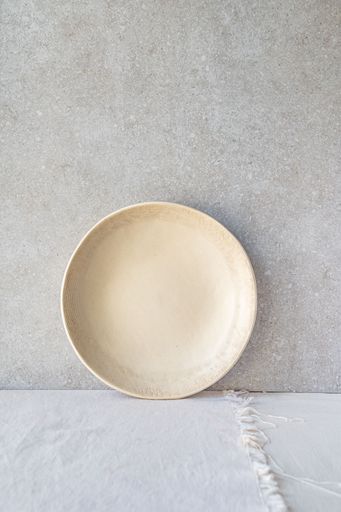 A selection of handmade ceramic pieces, vases, bowls, candleholders and plates