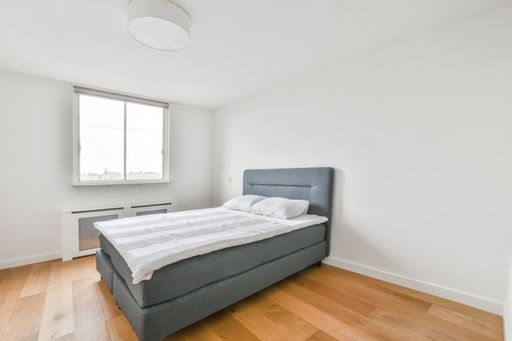 A beautiful bedroom with a modern interior