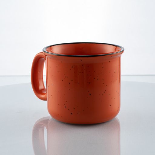 A vintage orange vase for casual breakfast on a white background and glass table