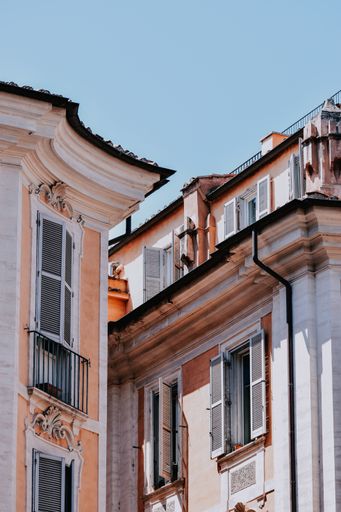 A vertical shot of European-style buildings in Rome, Italy.