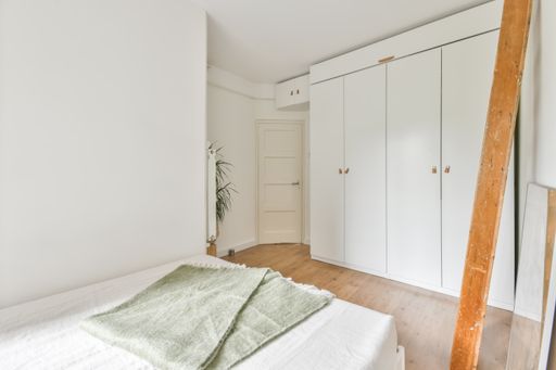 A beautiful furnished cozy bedroom interior