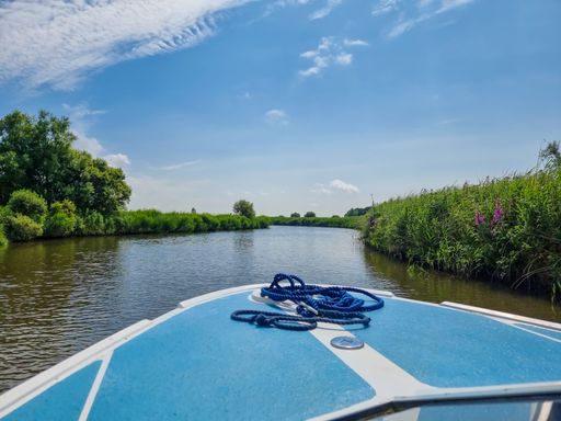 Boating on a day hire boat in Norfolk Broads
