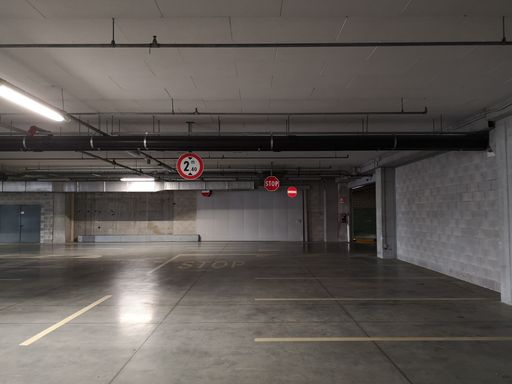 A closeup shot of an empty and covered parking of a mall