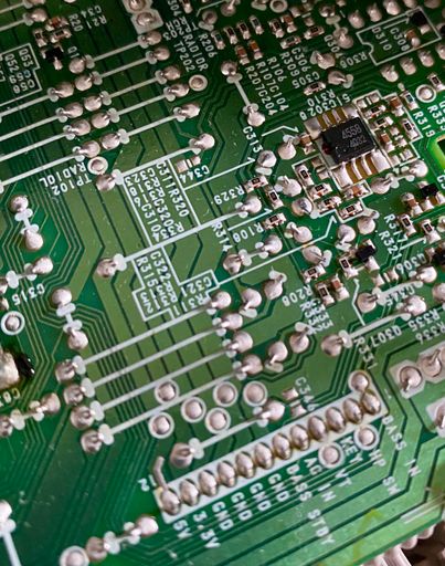 A macro shot of a circuit board from an alarm clock