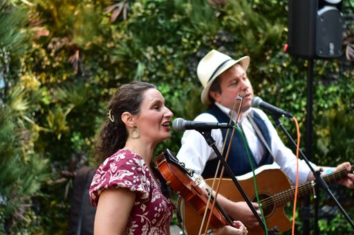 Fiddle and Strum bring folk music and song to the Party in the City, part of the Bath Festival. Bath, England. May 16 2025