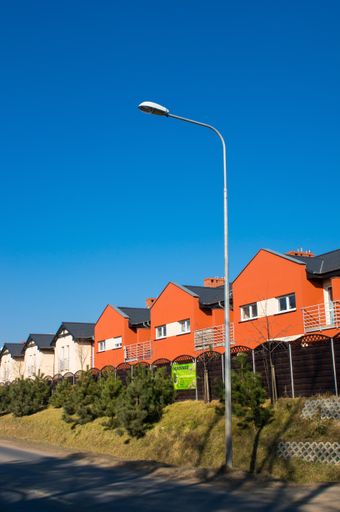 A row of new houses on a sunny day, Komorniki, Poland