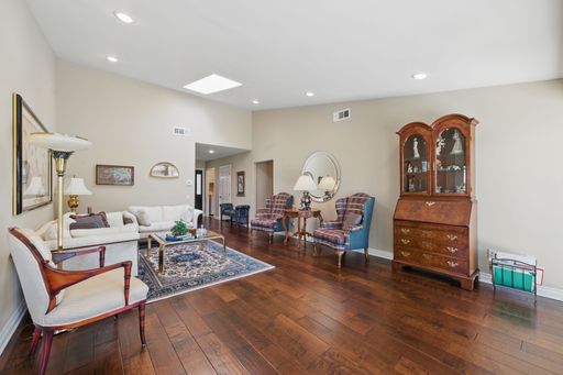Comfortable California home with open-plan living, cozy bedrooms, golf course views, and lush backyard perfect for family living.