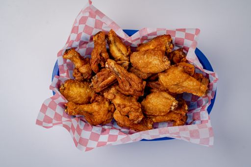A closeup top view of a fried chicken bites isolated on a white background
