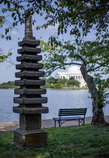 A vertical shot of the Gift of Friendship and the Jefferson Memorial in the back in Washington DC, Maryland, USA