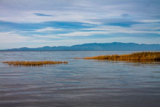 A beautiful shot of a seascape during the day under the cloudy skies
