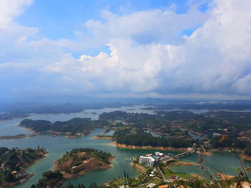 A beautiful shot of Guatape under a blue cloudy sky