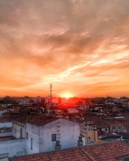 A fascinating sunset behind a beautiful town.
