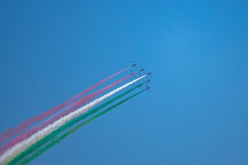A color trail from the aircraft forming a Hungary flag in parade