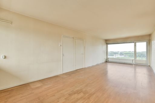 An empty laminated room with no furniture - modern interior, new house