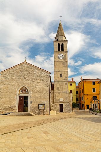 A vertical shot of Cosmos and Damien Church in Fazana, Croatia.