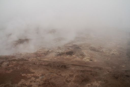 A beautiful view of the hills and mountains on a foggy day