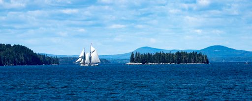 A panoramic shot of schooners and islands of Penobscot Bay in Deer Isle, Maine, USA