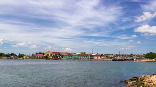 A Panoramic Shot of Matanzas Bay, Cuba in under a cloudy blue sky on a sunny day