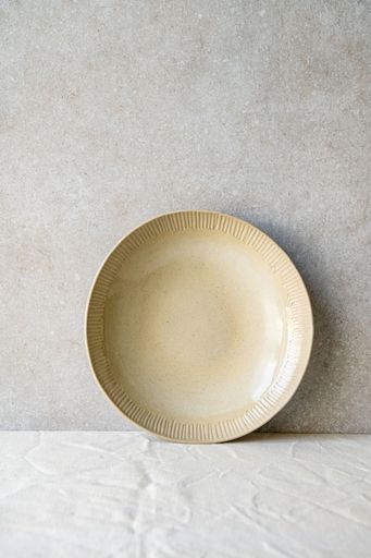 A selection of handmade ceramic pieces, vases, bowls, candleholders and plates