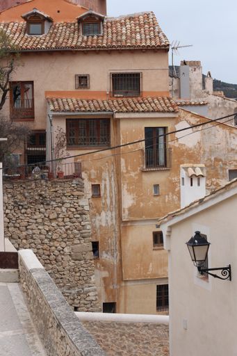 A vertical shot of old partially ruined buildings