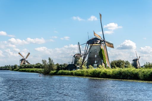 Beautiful dutch windmill landscape at Kinderdijk in the Netherlands on a sunny summer day