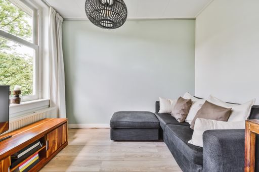 A light living room with minimalist modern furniture and dec