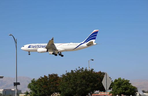 National Airlines Airbus A330 landing at San Jose airport with Diablo mountains in the background