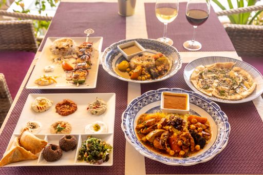 A dinner table with fresh dishes