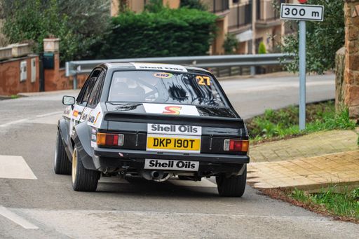 Gregory McCormack and Caron McCormack navigate a turn in their Ford Escort RS1800 during the 73rd KH7 Costa Brava Rally