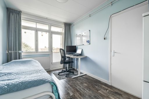 A cozy bedroom in an apartment in Amsterdam, Netherlands