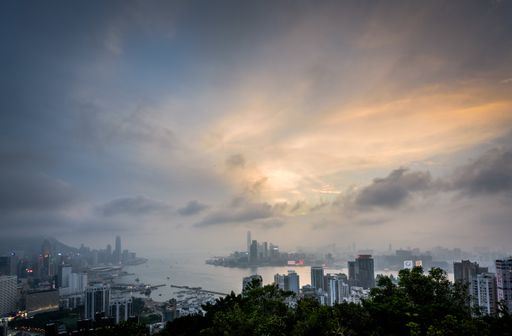 A high angle shot of the city of Hong Kong captured under the beautiful cloudy sky