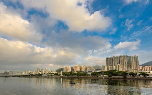 A high angle shot of the city of Hong Kong captured under the beautiful cloudy sky