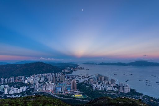 A high angle shot of the city of Hong Kong captured under the beautiful cloudy sky