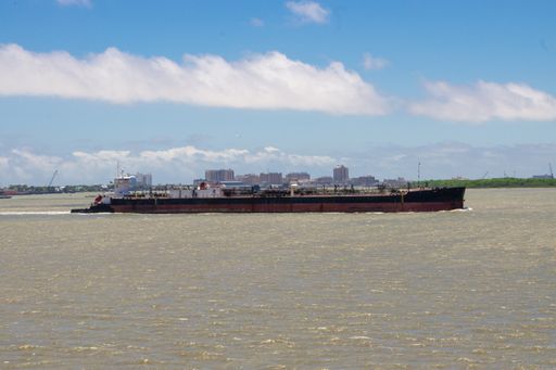 Tanker push barge navigating in Houston ship channel. Push tug, pushing the tanker barge, inland waters of USA.