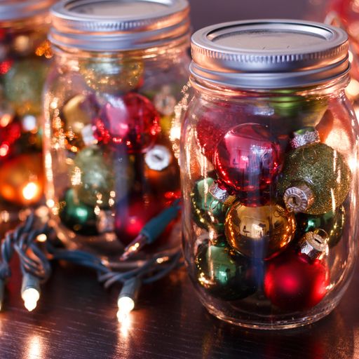 A closeup shot of colorful small baubles inside the glass jars