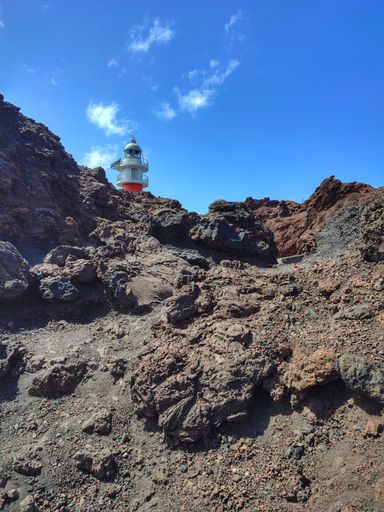 A vertical shot of Punta Teno Lighthouse unfolding on a sunny day.