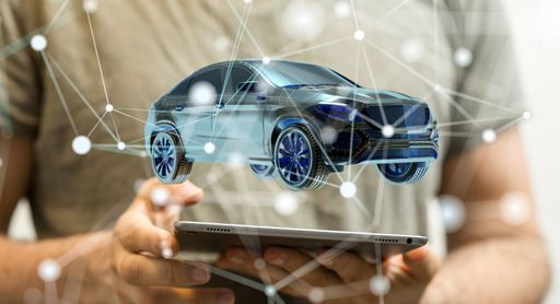 A 3d rendering of an Electro car hologram over a mobile tablet- Electromobility e-motion concept