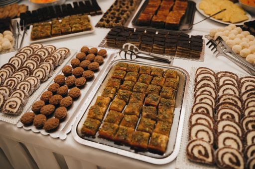 A high angle shot of pastries on a buffet table